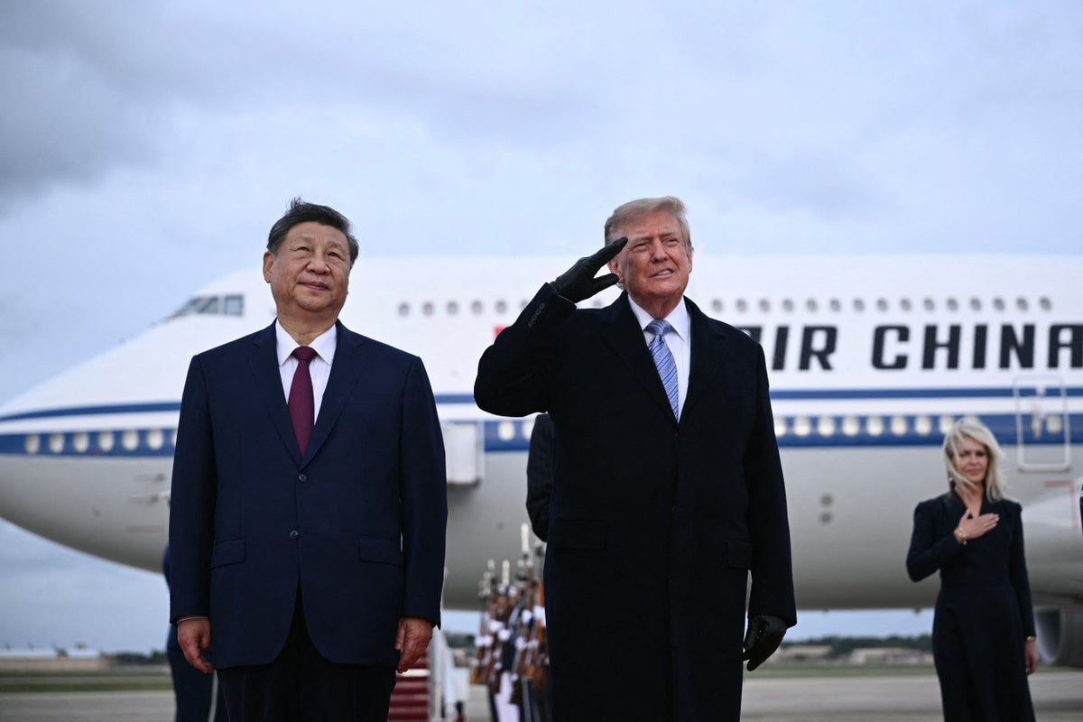 Trump posts photo of his greeting Xi – and Natalie Harp is the only other person in the frame