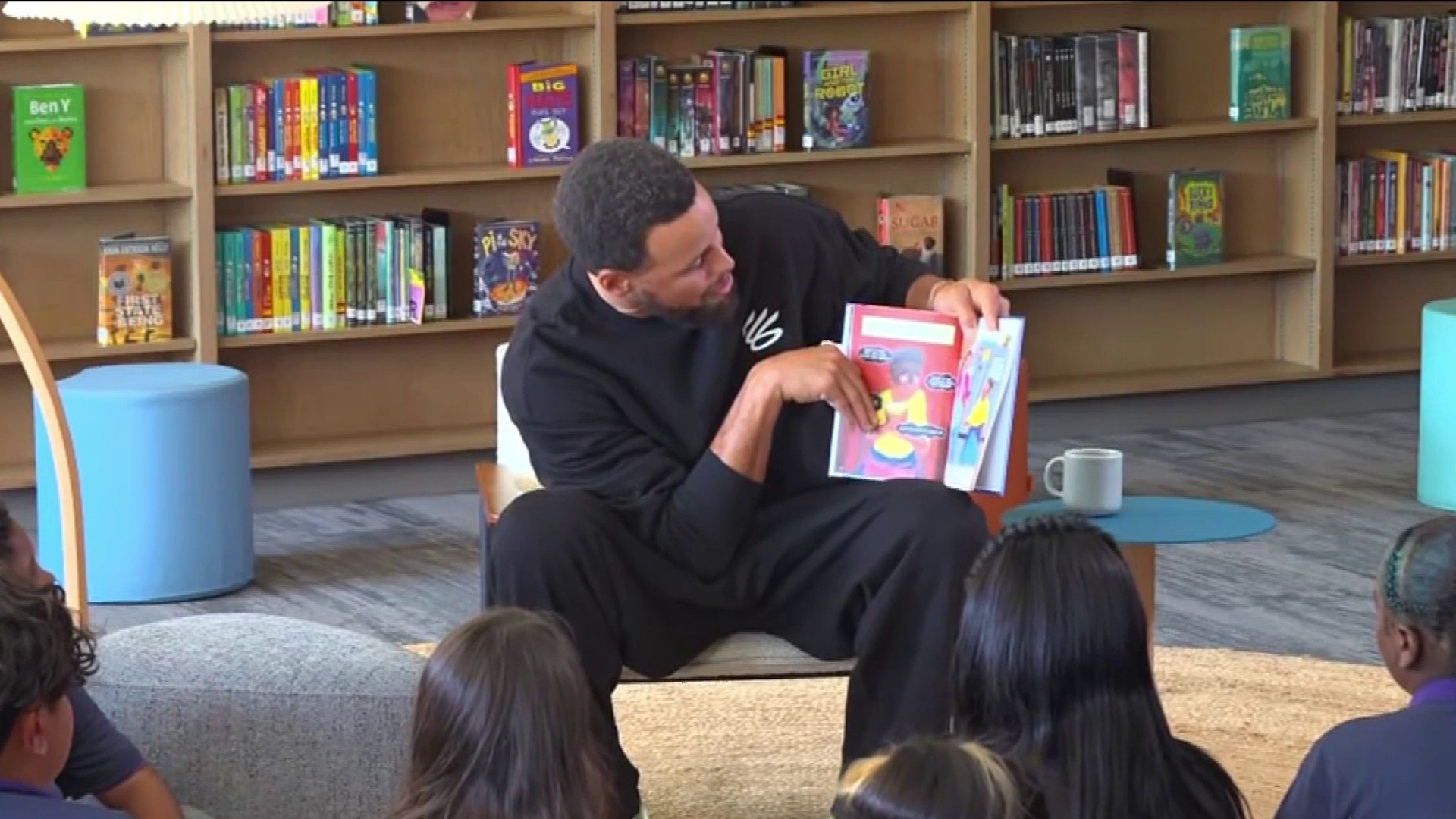 Steph Curry visits East Oakland school, talks vision issue
