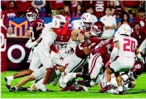 FOR BETTER OR WORSE, OU RIDES WITH ITS QB