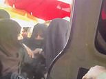 Afghan women are rounded up and dragged into a van by female Taliban morality police in latest brutal crackdown