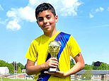 Schoolboy, 11, was killed by train at crossing while 'distracted by his phone', inquest rules