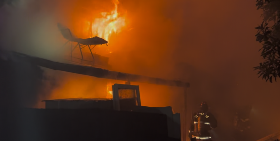 House fire erupts in Southeast Portland amid strong winds