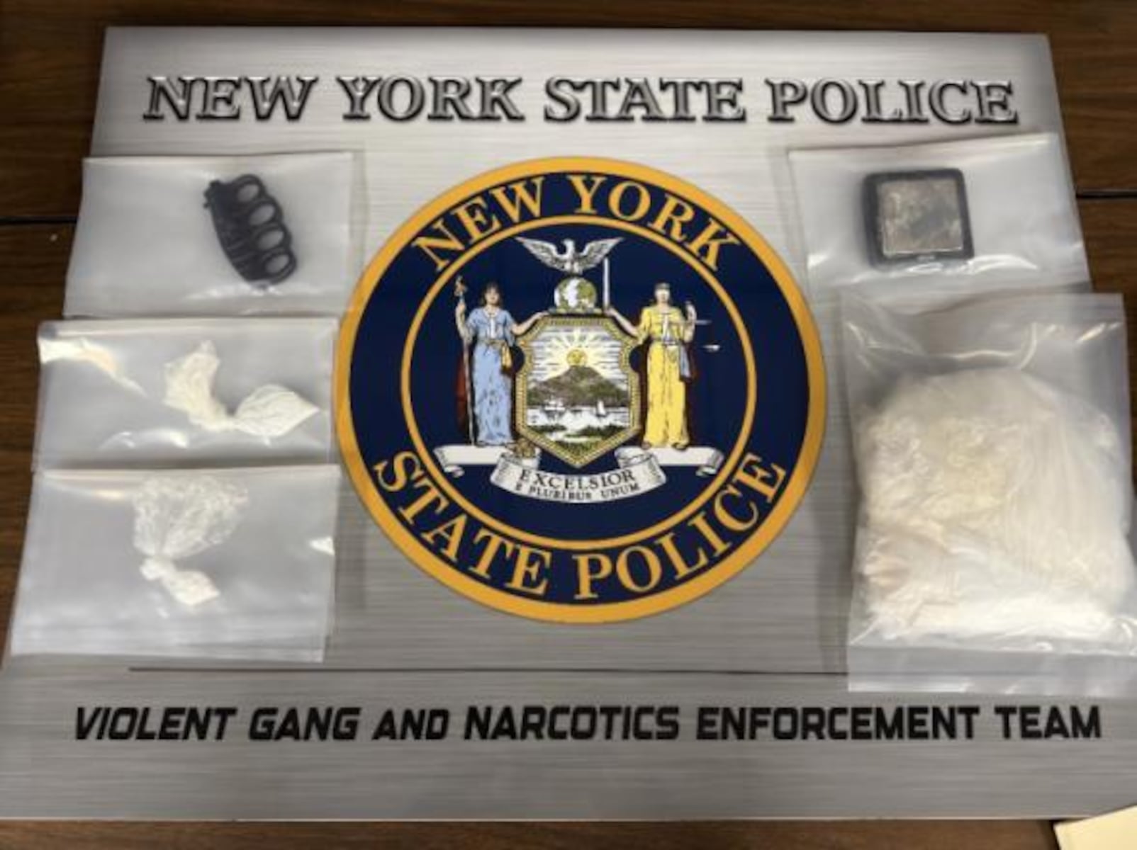 DeWitt man arrested after police find cocaine, weapon and packaging materials in home