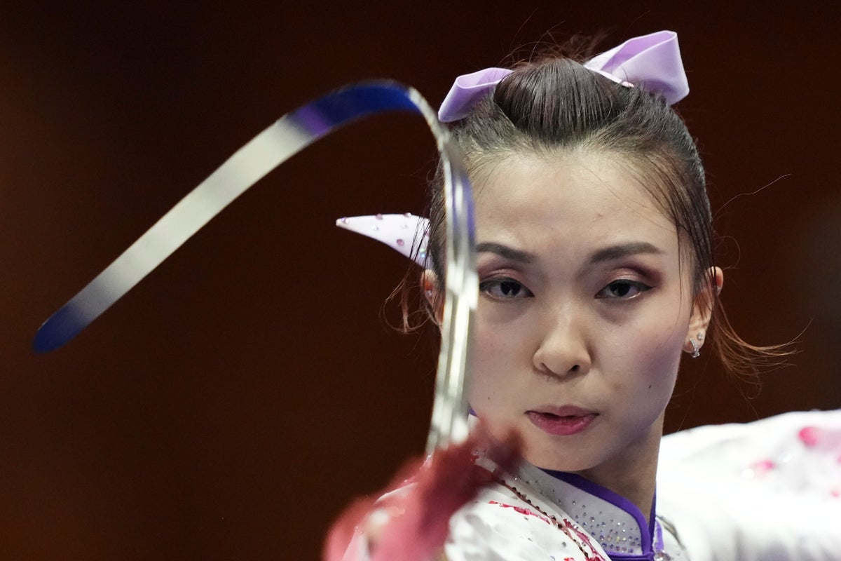 Photos of record-breaking swimmers and more from the Asian Games’ first week