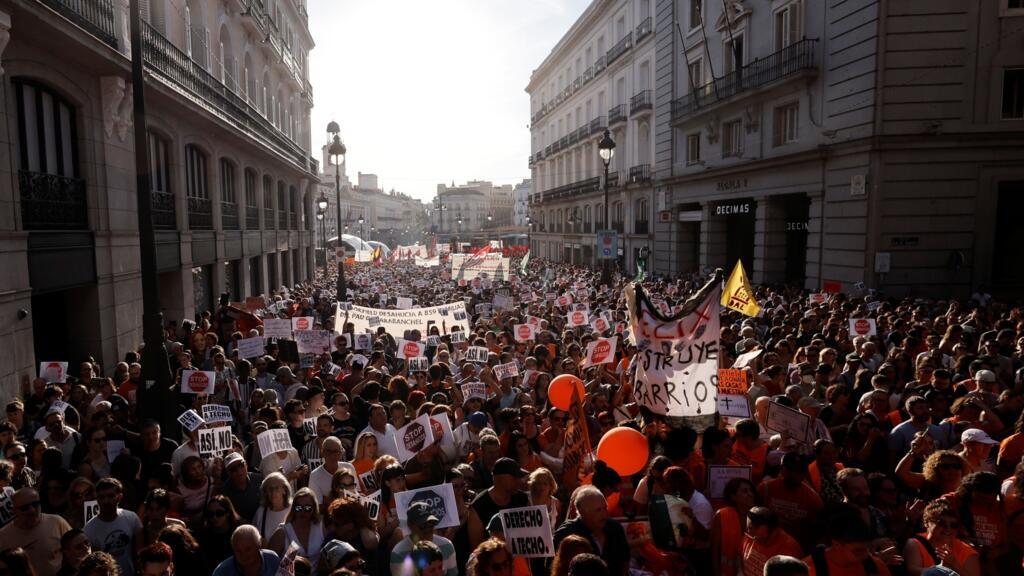 Thousands march in Madrid to protest eviction of 87-year-old woman