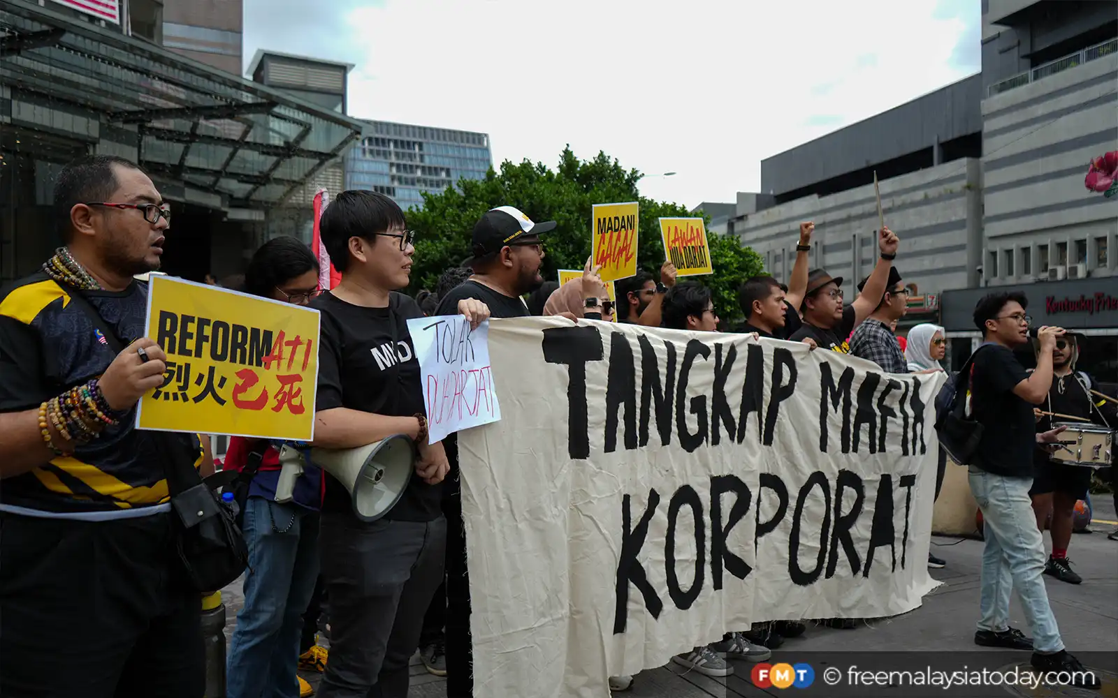 Protesters urge action against ‘corporate mafia’, arrest of activists