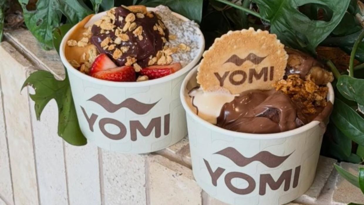 Watch: People queue around the block for new frozen yoghurt store