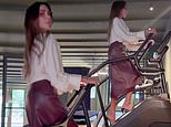Victoria Beckham tackles the Stairmaster in four-inch stiletto heels as she squeezes in a workout ahead of her Paris Fashion Week show