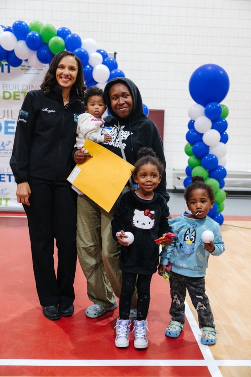‘A blessing’: 67 Detroiters receive deeds to their homes
