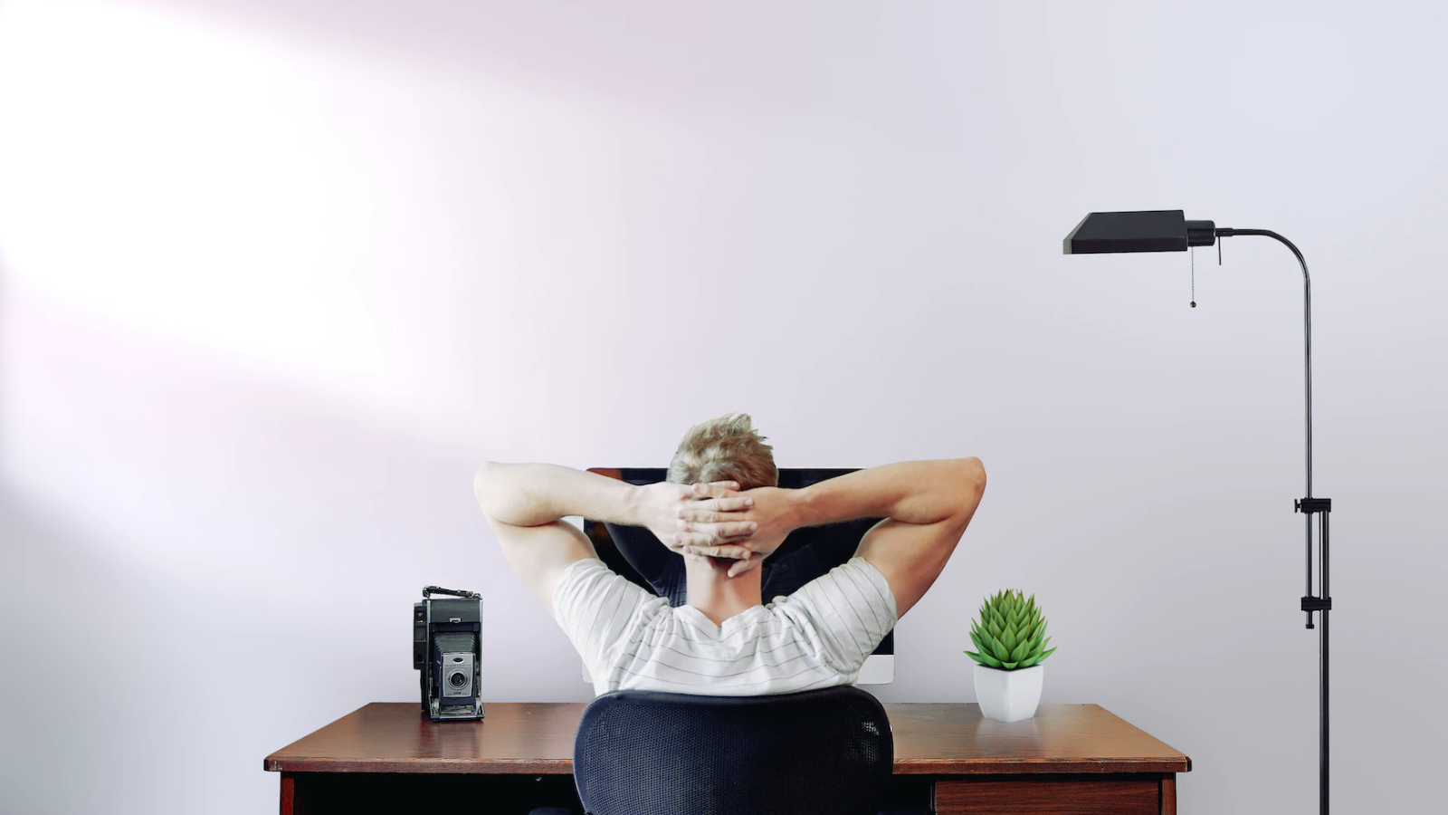 New data suggests recent grads aren't being hit by AI effect on hiring — but for how long?