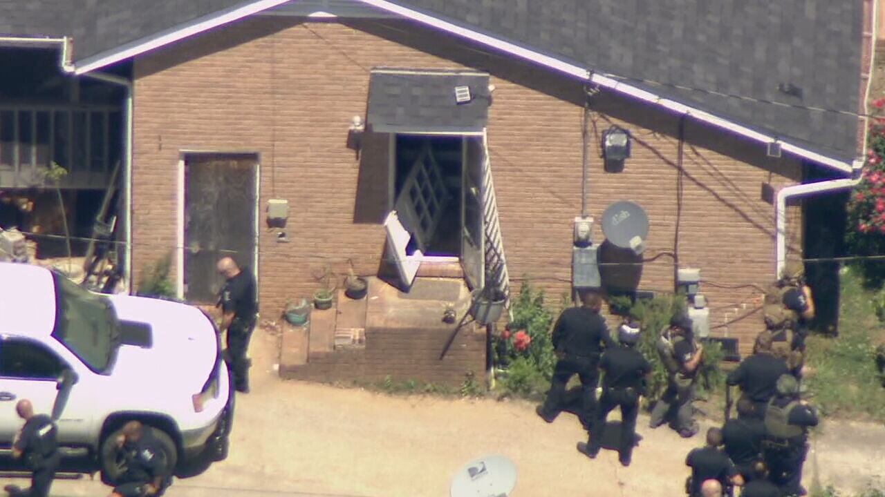 Woman charged with supplying gun to felon who killed 4 officers in 2024 ambush