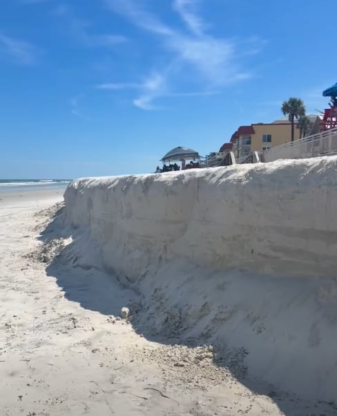 King tides carve 5-foot sand cliffs along New Smyrna Beach