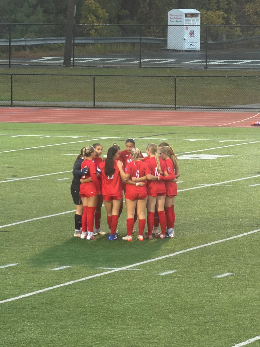 Who prevailed in a clash of girls soccer contenders in Natick?