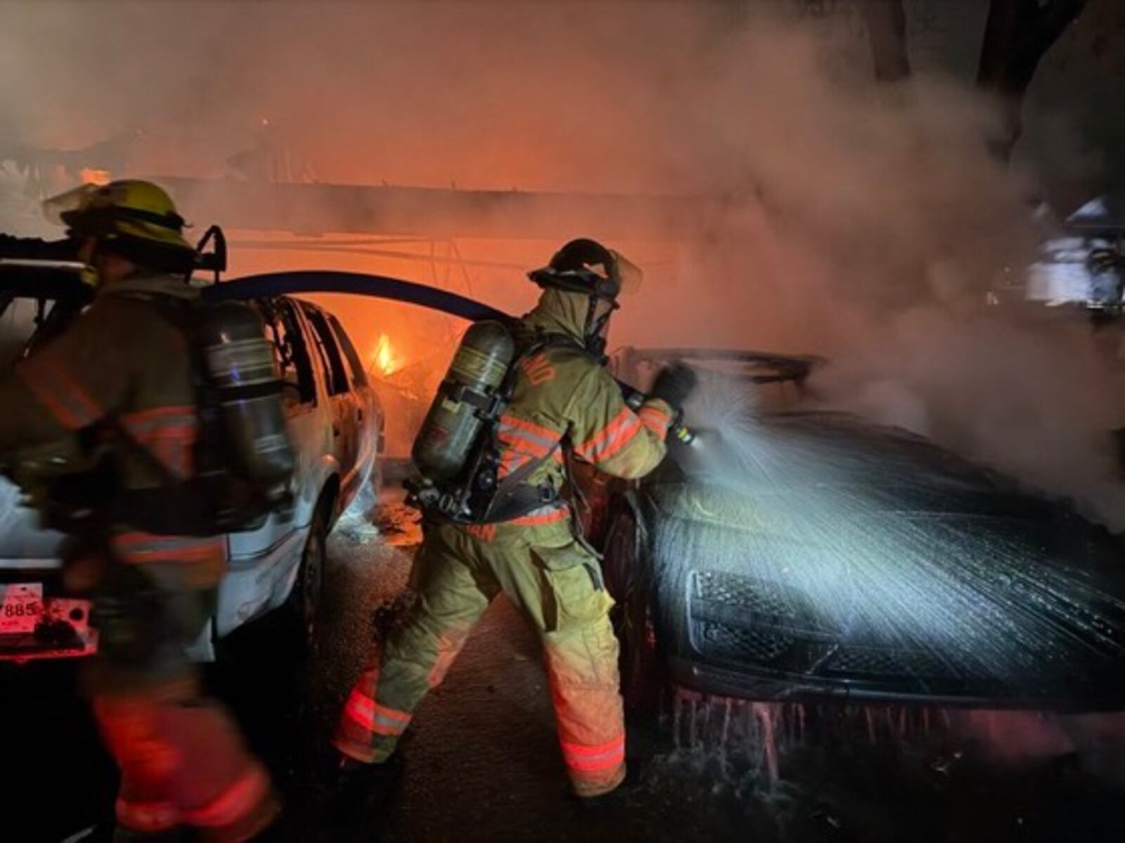 Firefighters discover flaming natural-gas pipe, downed power line at SE Portland townhouse fire