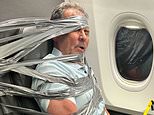 Plane passenger from hell who was duct-taped to seat during flight warned about 'rude awakening' during first court appearance