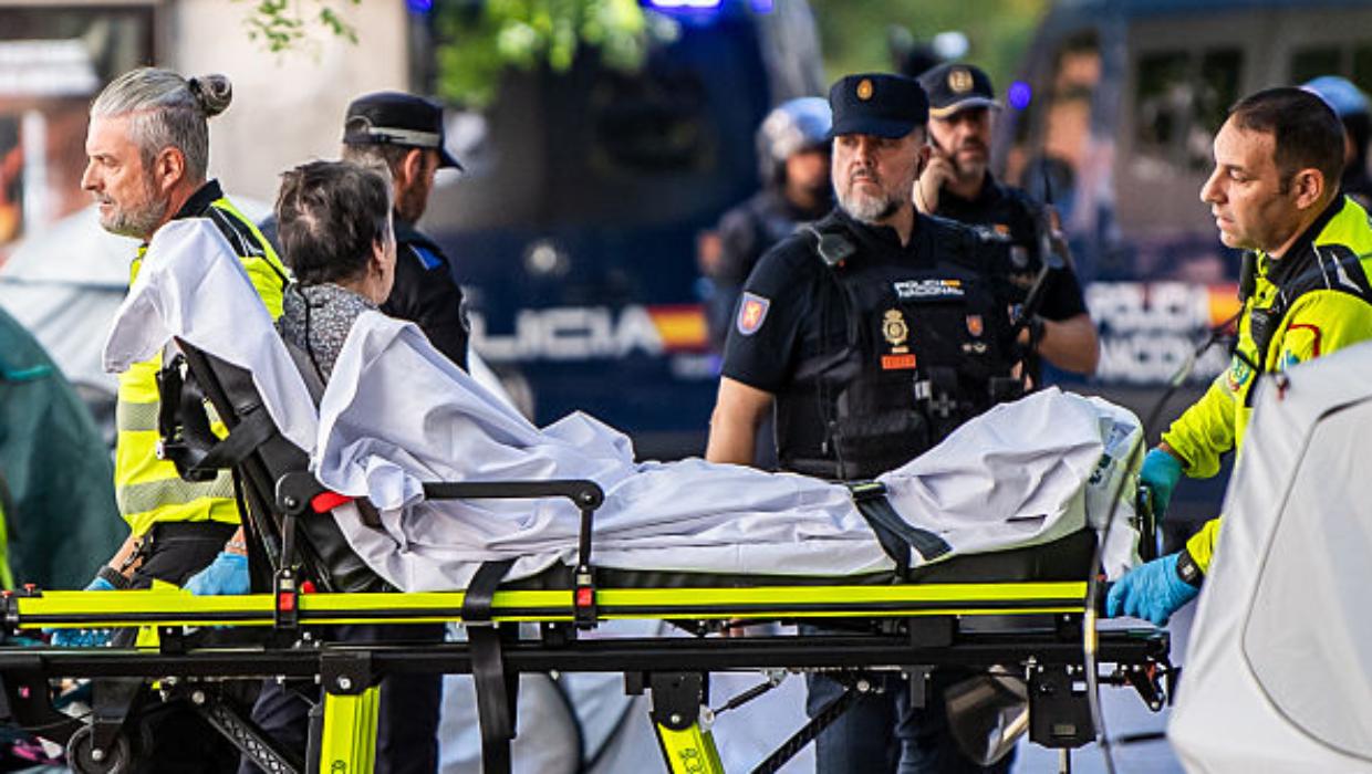 They broke down her door and carried her out. Then Spain erupted
