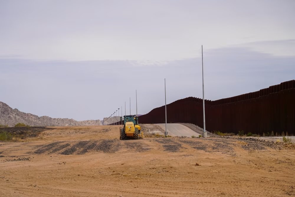 Trump's border wall construction cut into an ancient ground carving older than Stonehenge