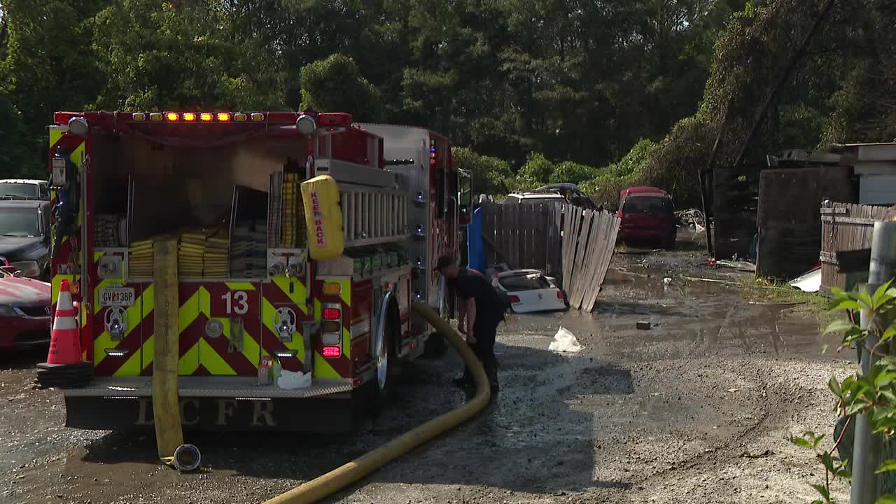 Fire at DeKalb County junkyard spreads to woods, officials say