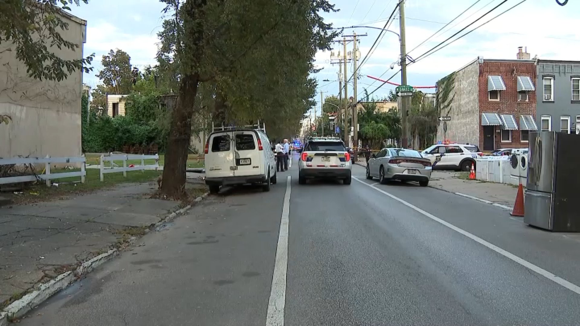 Elderly neighbor hit by stray gunfire during shootout on her block, police say