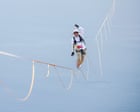Daredevil Jaan Roose prepares to walk slackline high above central Seoul