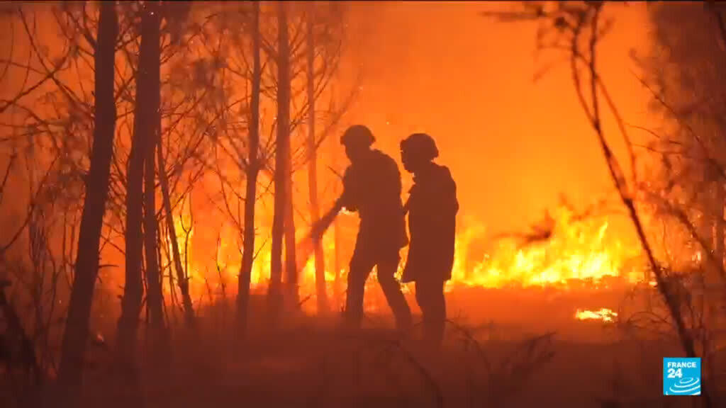 French firefighters battle the blaze with local residents through the night