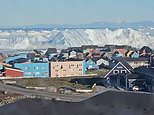 Moment enormous iceberg capsizes triggering tsunami-like waves off coastal town in Greenland