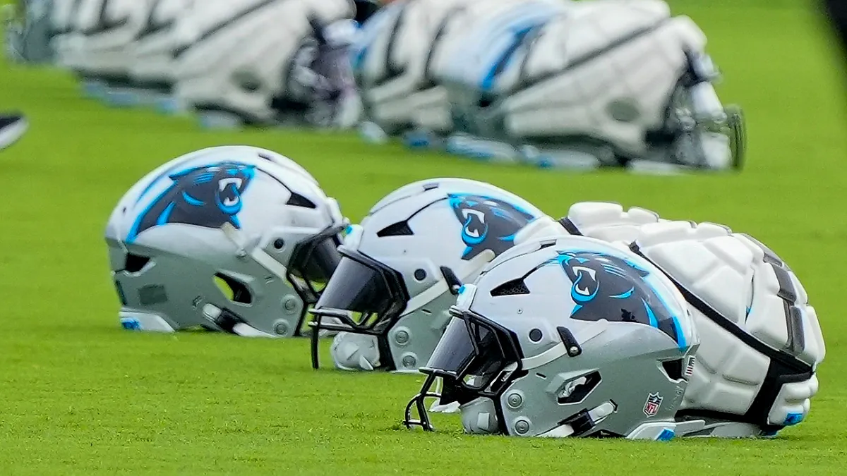 Panthers DL Cam Jackson embraces Tershawn Wharton's coaching