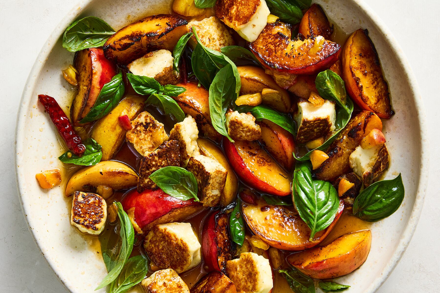 Seared peach and panela salad