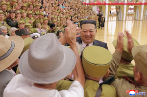 Kim Jong-un joins war veterans for photos on North Korea's 'Victory Day'
