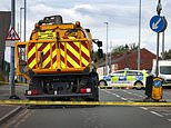 Pedestrian, 64, dies 'after being hit by a road sweeper' in Salford