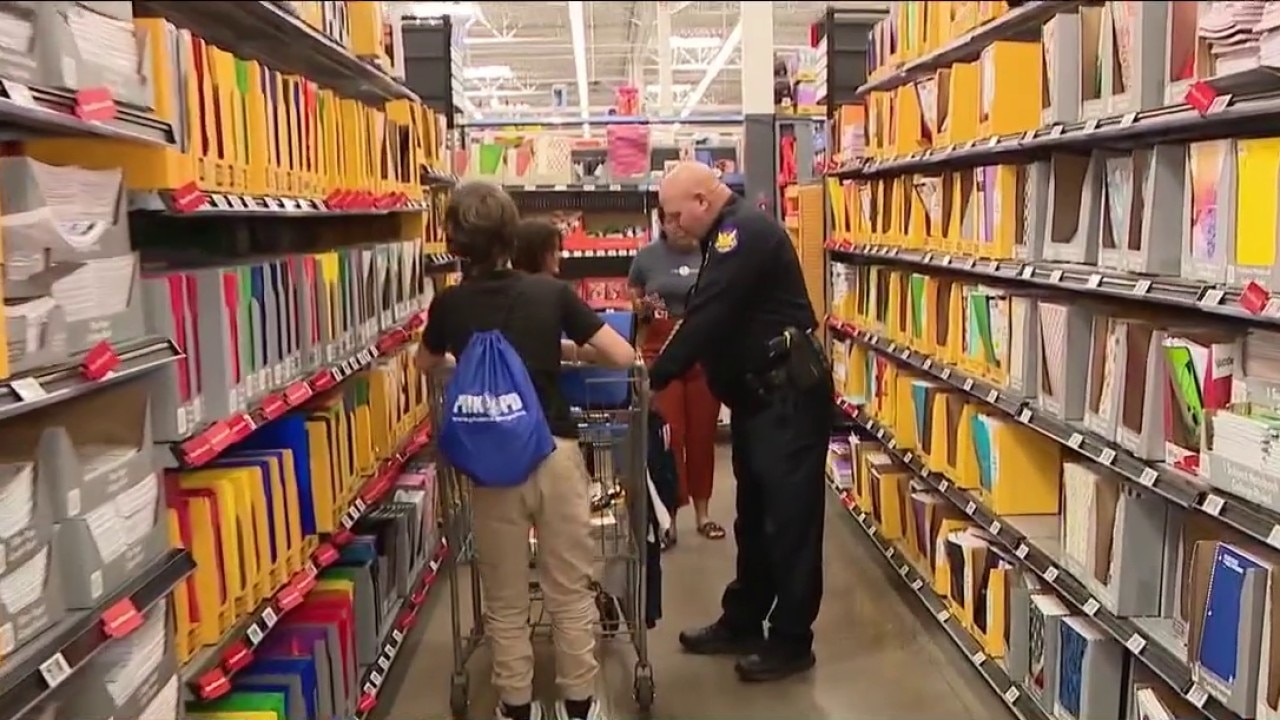 Phoenix Police officers help kids buy supplies