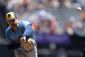Brewers pitcher's arduous journey brings him back to major leagues