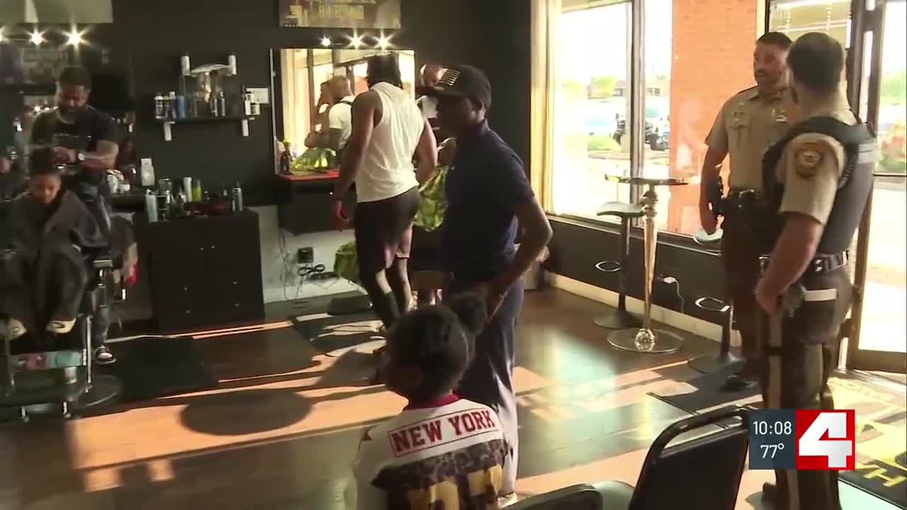 Community event brings residents, police together at Florissant barber shop