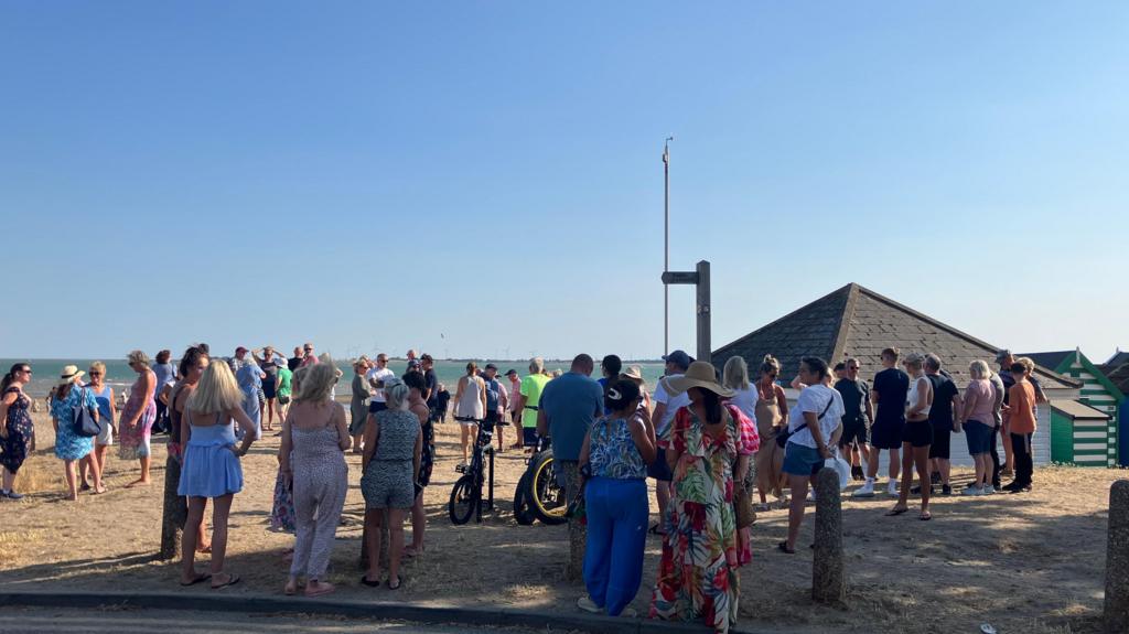 Community holds vigil for three killed at beach