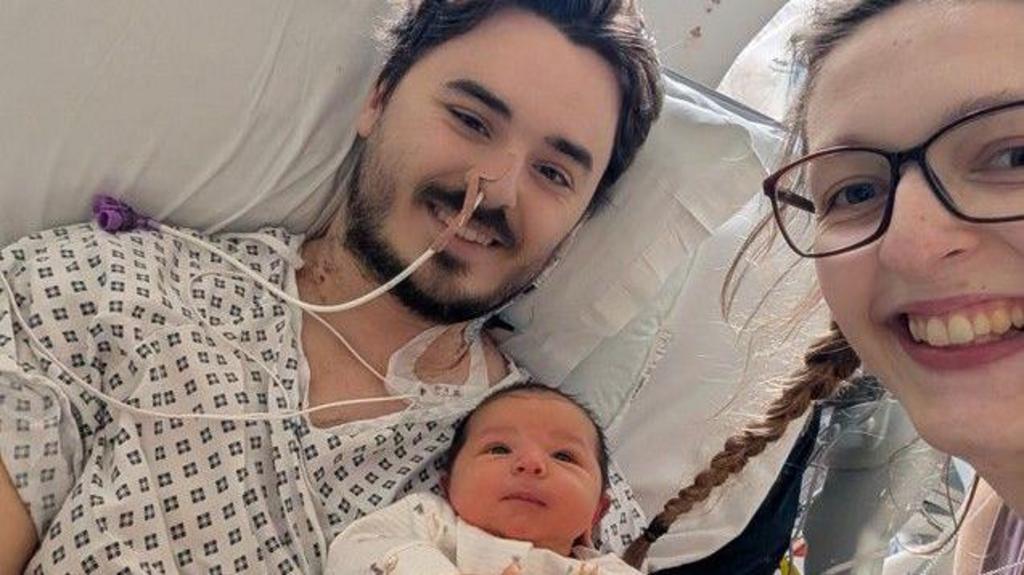 Man wakes after cardiac arrest to see 'unbelievable' new baby