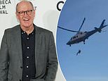 Dramatic moment Oscar-winning Disney animator, 72, is AIRLIFTED off mountain in helicopter rescue after suddenly falling ill on hike