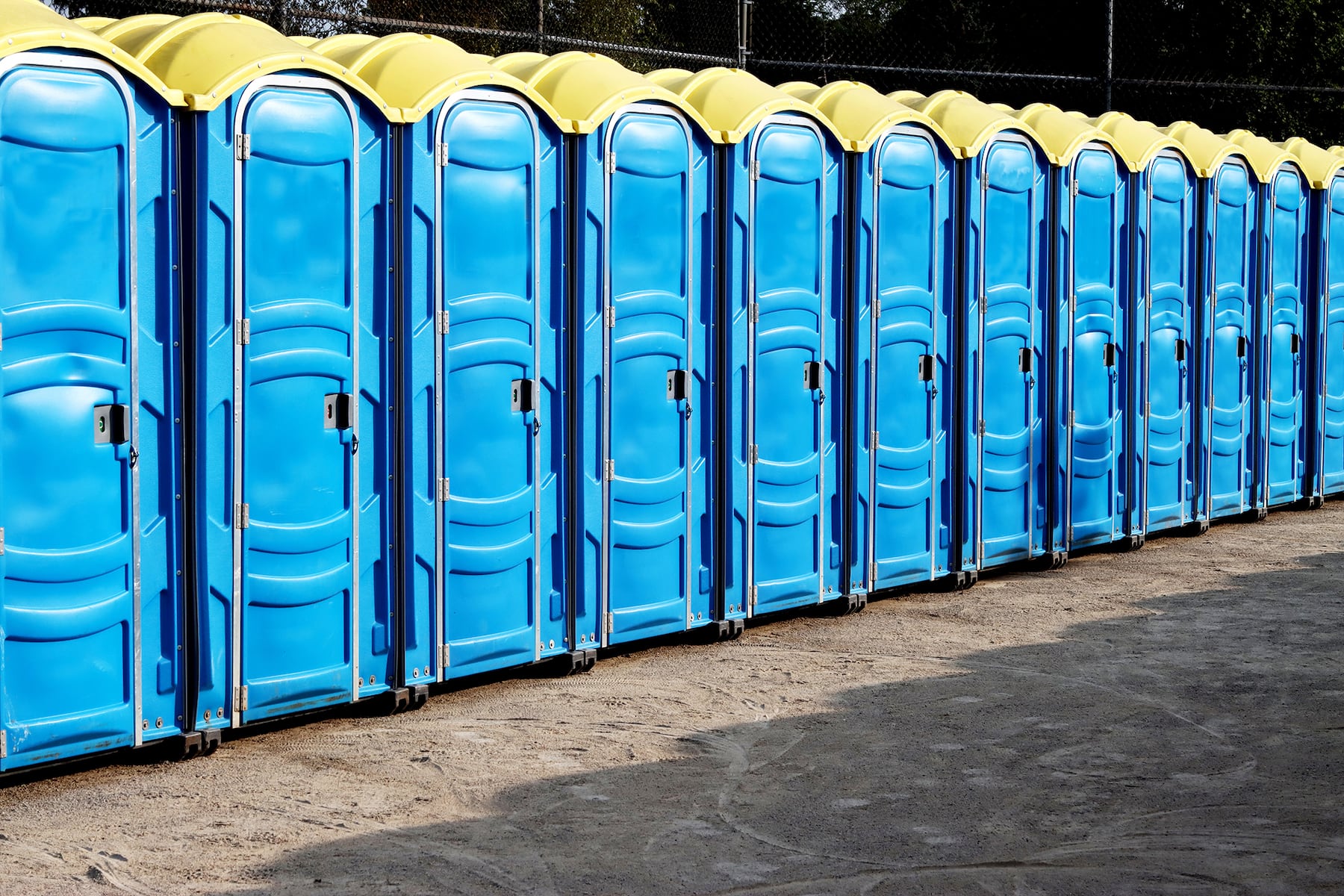 Man dead after portable toilet flies off truck, crashes into car