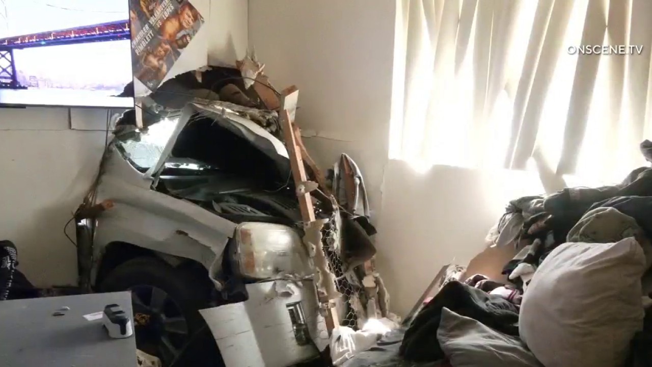 Car slams into home in Riverside