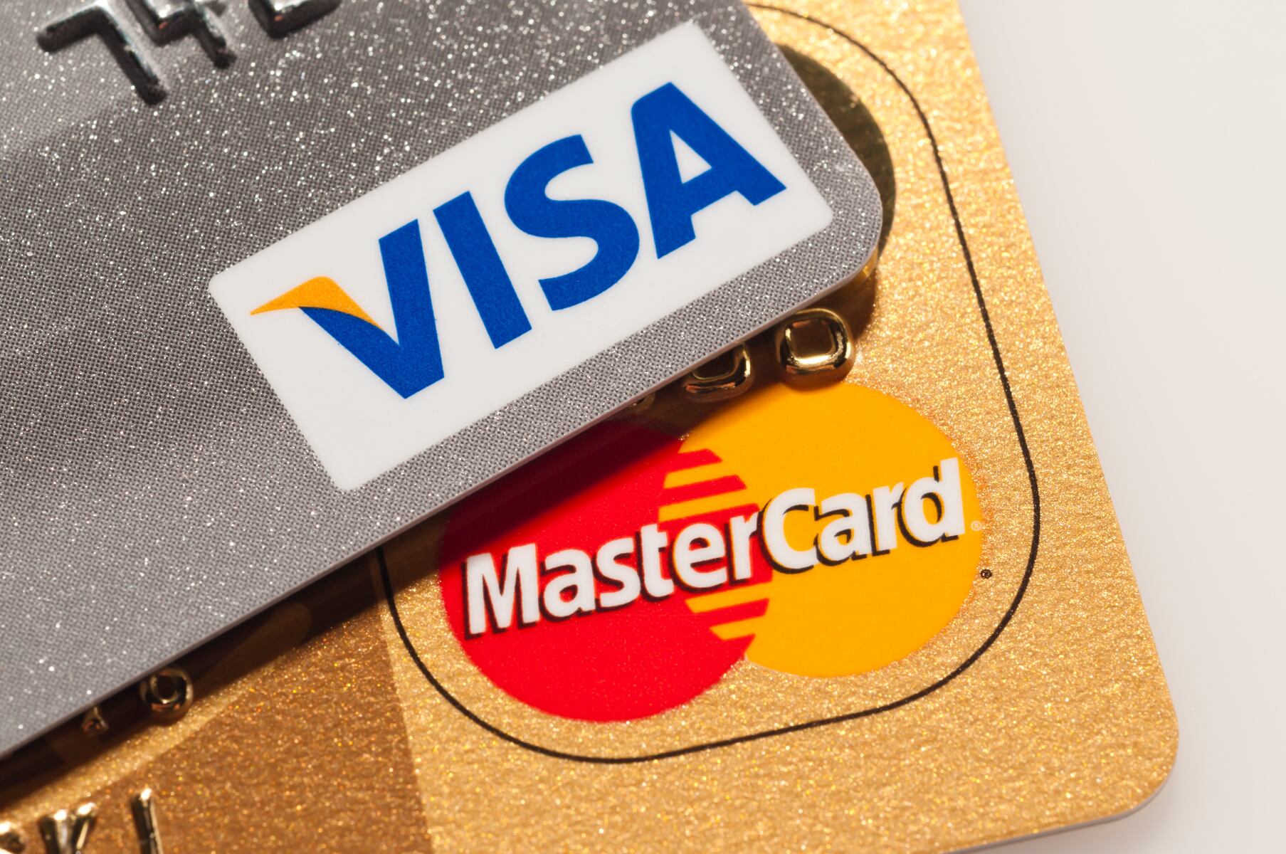 Visa, Mastercard make bank on swipe fees, report claims
