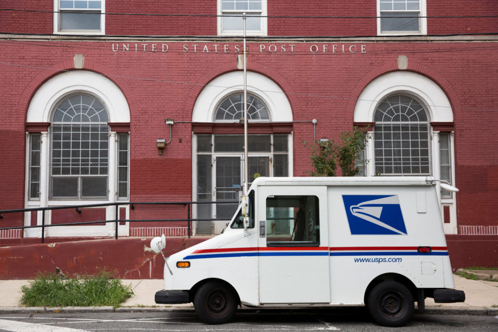 Trump's attacks on mail balloting and concerns over delays turn midterms spotlight on Postal Service