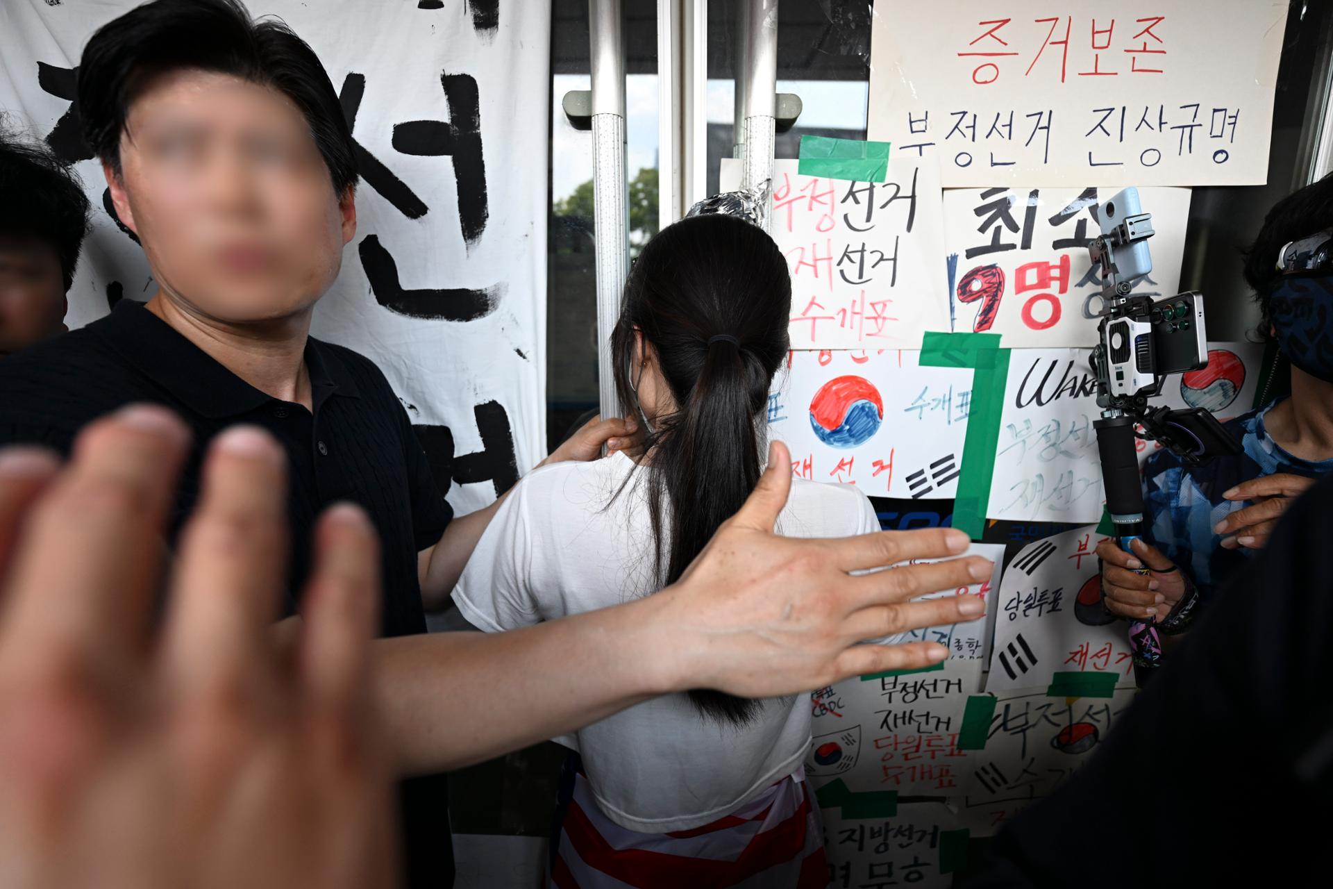 Woman referred to prosecution over blockade of vote counting center