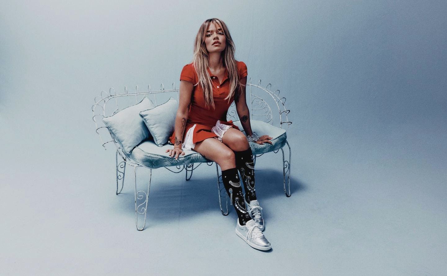Karol G Adds Fuel To Her Sweeping Tour Marketing With New Reebok Collab