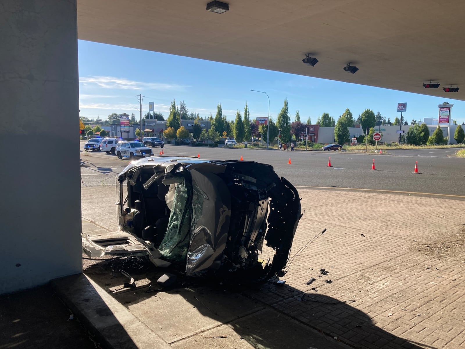 Car flips after running red light in Clark County; driver and passenger seriously injured