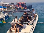 Tourists flee to Greek coast for sea evacuations after new wildfire breaks out