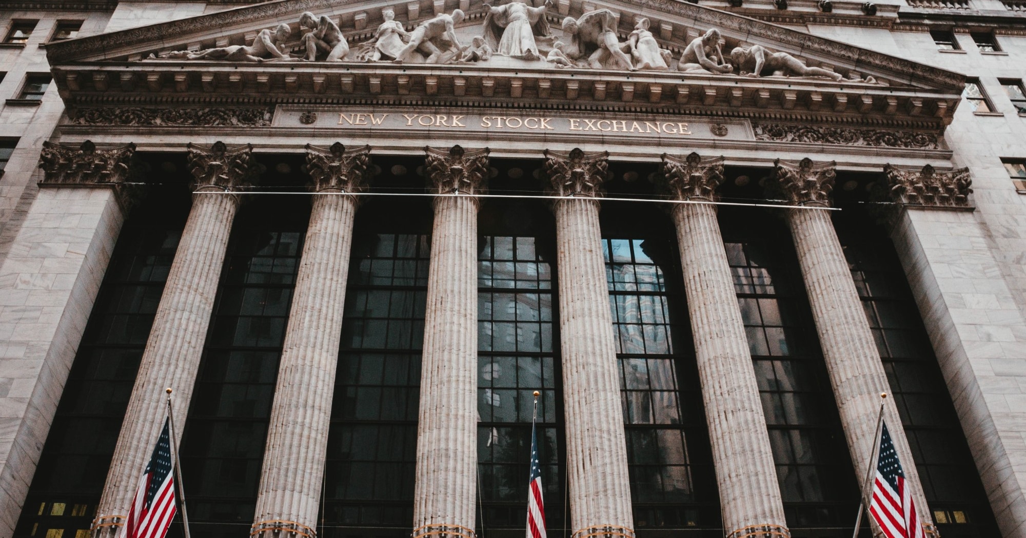 Wall Street recovers from volatile week as AI boom shows first real cracks