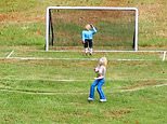 Model village is forced to remove figurine of topless streaker after 'small number' of visitors complained it was 'inappropriate'