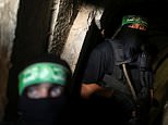 Director of 'fake' charity faces extradition to the US after he is arrested in Britain over claims he funnelled money and supplies to Hamas