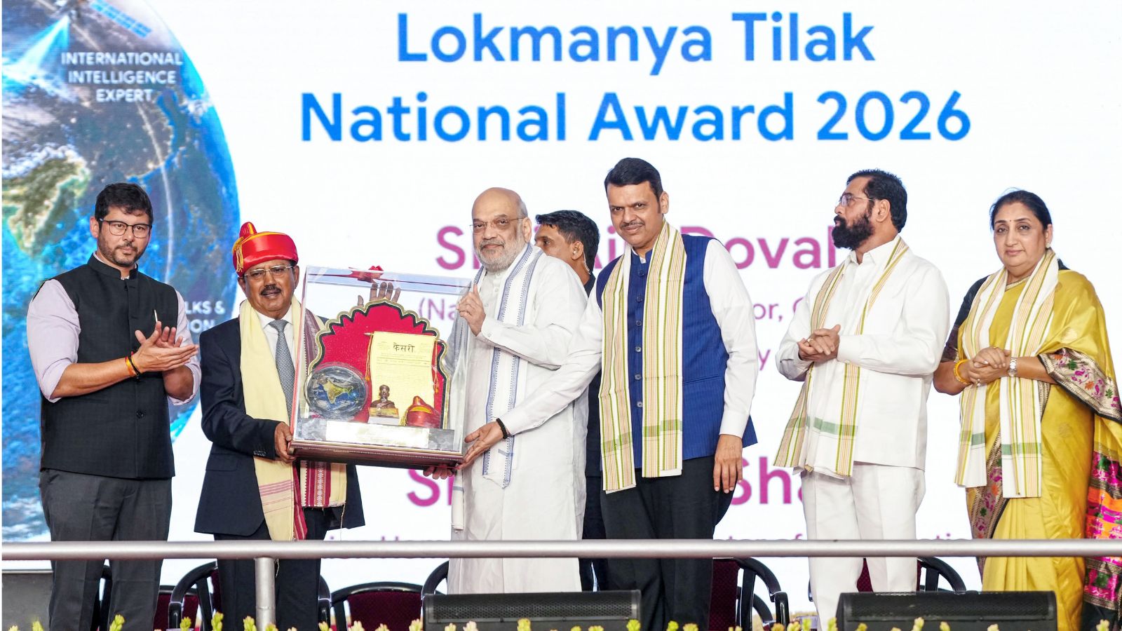Amit Shah presents NSA Doval with Lokmanya Tilak National Award