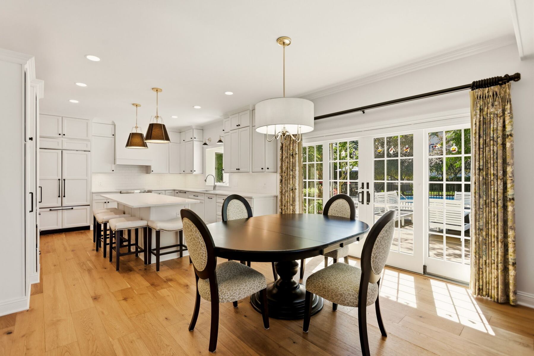 This charming Michigan home for sale has everything: a pool, gourmet kitchen, and it’s in a beloved Christmas town