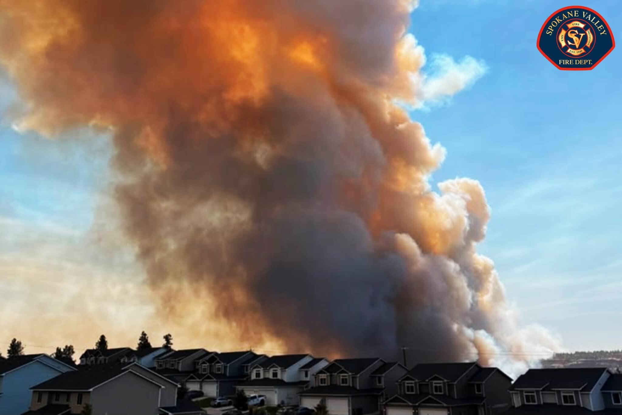 Fast-moving wildfires threaten city of Spokane, WA; Neighborhoods told to evacuate